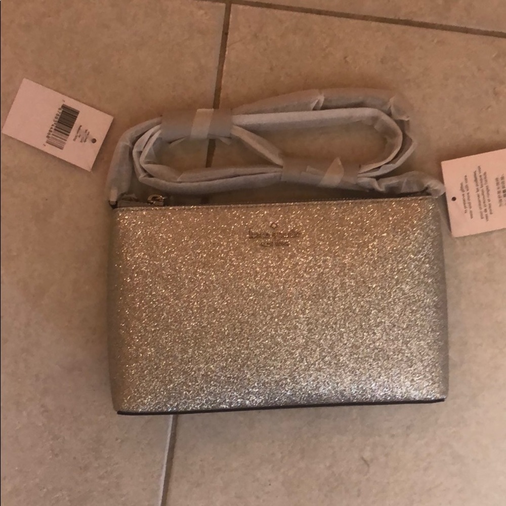 Kate Spade silver crossbody. Brand new